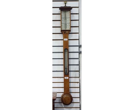 Victorian oak stick barometer, with twin 24 hour silvered pressure dials, temperature dial below, height 96cm