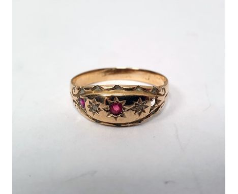 Gold, ruby and diamond ring, gypsy set, two tiny diamonds alternating two tiny rubies (one ruby missing)