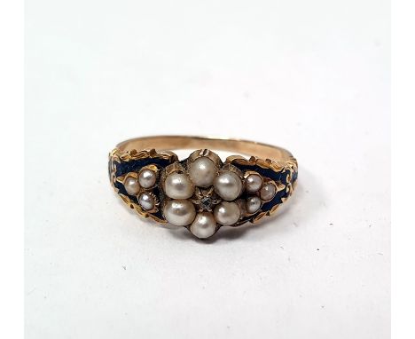 Victorian gold, seedpearl and enamel memorial ring, the central seedpearl flowerhead cluster surrounding a diamond chip, the 