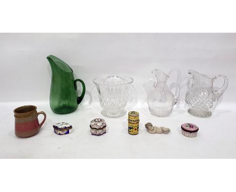 Three glass water jugs, a glass vase, a quantity of patch pots, a mug and a Lladro putti 