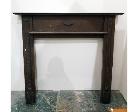 Old oak fire surround with mantelpiece, width 137cms