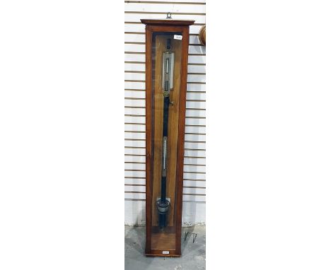 A scientific stick barometer&nbsp;by A Gallenkamp &amp; Co. London No. 5709, with pressure gauge and thermometer, mounted in 