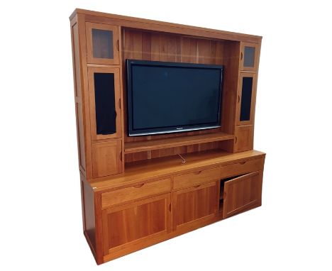 Modern solid cherrywood custom-made unit, (holding a Panasonic flatscreen television, the screen 122cm), flanked by cupboards