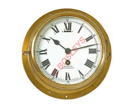 RAF Marine Craft, Air Sea Rescue launch Brass Ship’s Clock by Smiths. A rare example of a brass cased bulkhead clock, the whi