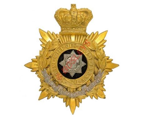 Badge. Cheshire Regiment Victorian Officer’s helmet plate circa 1881-1901 A fine gilt example. Crowned star mounted with laur