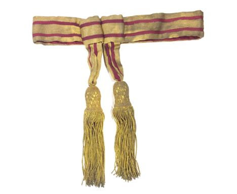 General Officer’s Waist Sash.  A regulation example in gold net, 2 ½ inches wide, with two crimson silk stripes. Gold fringe 