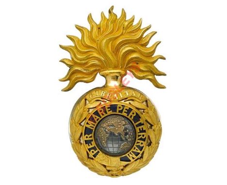 Badge. Royal Marine Artillery Officer’s helmet plate circa 1879-1905. A fine gilt example. Large flaming grenade, the ball mo