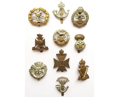 10 Infantry cap badges. S. Lancs (numbered) ... Ox & Bucks ... R, Hampshires ... Wiltshire ...  Hampshire ...  RWF ... DCLI .