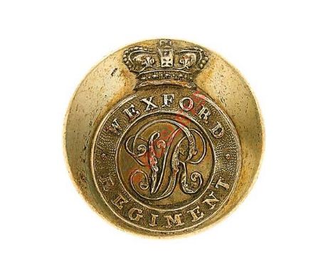 Irish. Wexford Militia Victorian Officer’s pre 1855  closed back silvered coatee button. Applied crowned strap “Wexford Regim