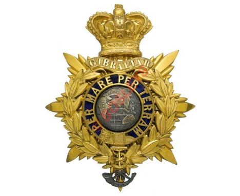 Badge. Royal Marine Light Infantry Victorian Officer’s helmet plate circa 1878-1901. A good gilt example. Crowned star mounte