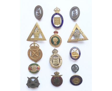 Badge. Selection of WW1 On War Service Badges etc. An interesting selection including:  Miniature Silver War Badge ... 2 x On