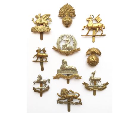 10 Infantry cap badges. Buffs ... R.Fusiliers ... Queens WW2 ... ditto beret ... Norfolk ... Northumberland Fusiliers ... Liv