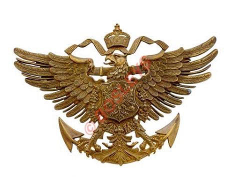 German Imperial Marines helmet / shako plate. A good die-stamped brass example with two “double blade” fixings to reverse. VG
