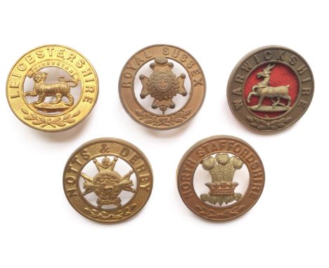 5 post 1881 helmet plate centres Leicestershire ... Sussex ... Warwickshire ... Notts & Derby ... North Staffordshire. All co