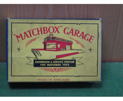 A Matchbox Garage Showroom & Service Station #MG1, the set comprises of garage roof mounted sign and clock, boxed Esso petrol