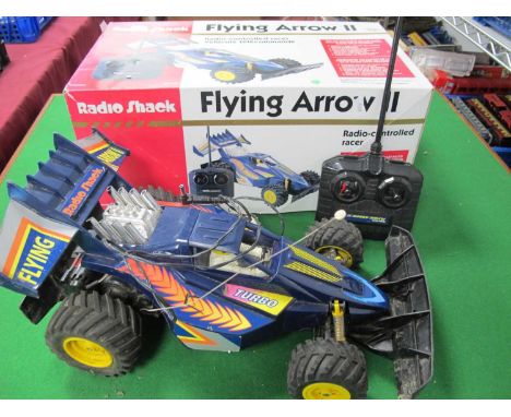 A Radio Shack #60-4150 Flying Arrow II Radio Controlled Racer (R/C) featuring RS360SH Racing Motor, Suspension, Super Grip Ty