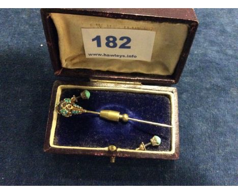 Tie pin of turquoise and enamel and pair of turquoise earrings