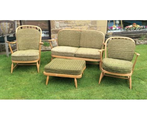 A good quality Ercol suite inc. two seater sofa  , his and hers easy chairs and a stool with contemporary material