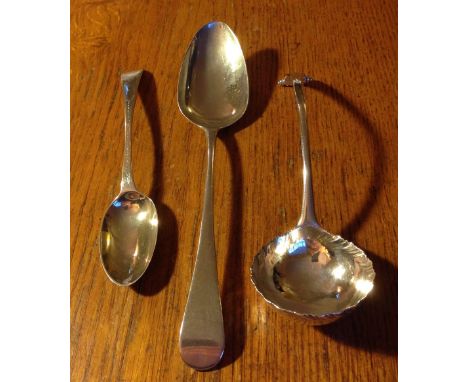 P & A Bateman dessert spoon 1792, a 1797 table spoon and an 18th c  feather edged toddy ladle