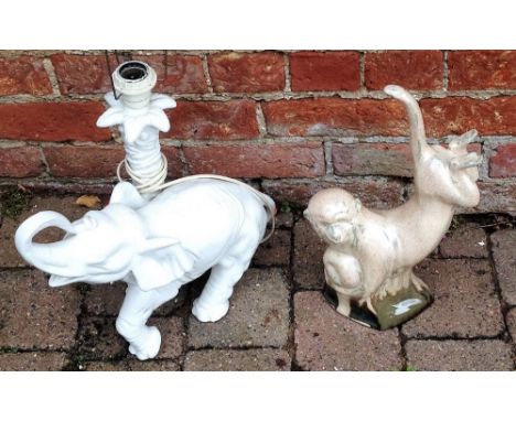 Chinese pottery lamp and an Oriental figure of a monkey
