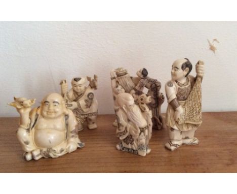 Five Japanese ivory netsuke inc. a buddha