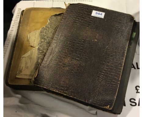 Two vintage postcard albums and a quantity of postcards