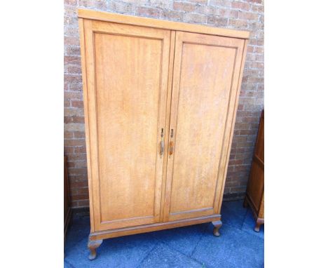 A LIGHT OAK THREE PIECE BEDROOM SUITE, ivorine retailers label for 'F Davis Hockley Birmingham', comprising wardrobe 120cm wi