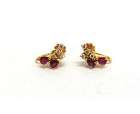 A PAIR OF RUBY AND DIAMOND EARRINGS each set with two pendeloque cut rubies with four diamonds above, the eight brilliant cut