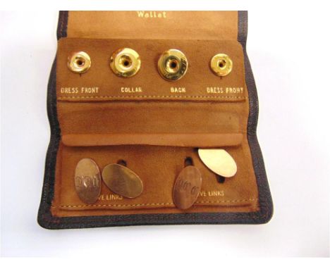 A PAIR OF 9 CARAT GOLD CUFFLINKS Birmingham 1932, the oval panels with chain connectors, monogrammed; in a leather wallet wit