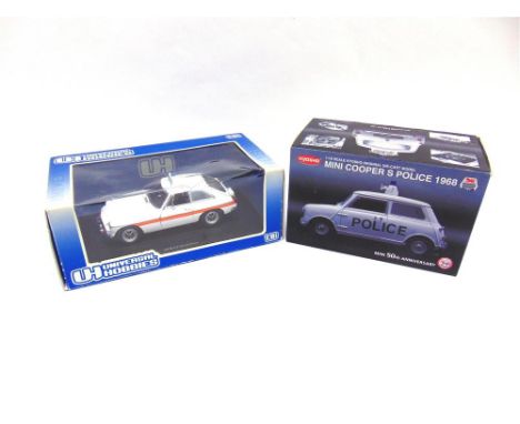 TWO 1/18 SCALE MODEL BRITISH POLICE CARS comprising Kyosho No.08104, Mini Cooper S 'Police'; and Universal Hobbies No.4452, M