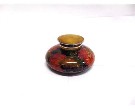 A MOORCROFT POTTERY INKWELL,  decorated in the 'Pomegranate' pattern, with metal rim and hinged lid, impressed and painted ma