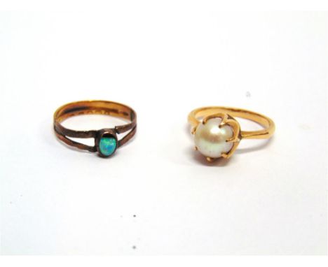 A SINGLE STONE CULTURED PEARL RING unmarked, 3.4g gross; an opal ring, to a 22 carat gold mount, 1.5g gross