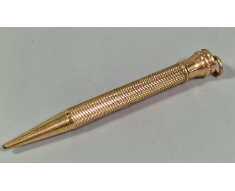 9ct gold engine turned propelling pencil, makers mark SJR Birmingham. 8cm long approx. (B.P. 21% + VAT).&nbsp;Overall weight 