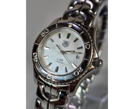 Tag Heuer ladies' steel Link 200 Meters bracelet wristwatch, with white face, having Baton numerals, sweep seconds hand and d