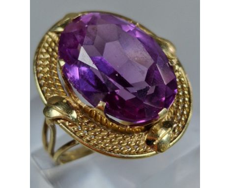 14K gold and amethyst ring of oval faceted form. 7.9g approx. Size O. (B.P. 21% + VAT)