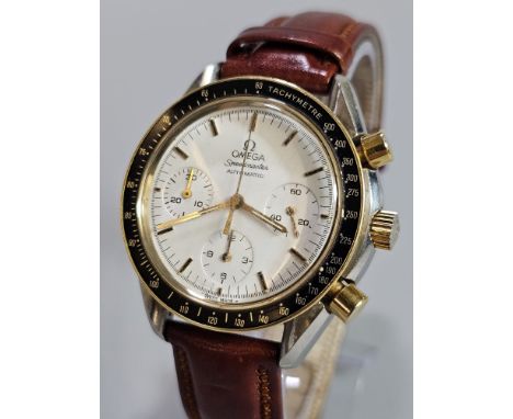 Omega Speedmaster Bimetal automatic Chronograph wristwatch, with white multi-function face having three subsidiary dials and 