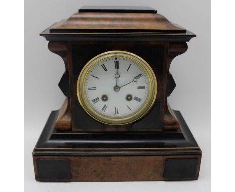 A late 19th century Continental mantel clock, walnut veneer and ebonised case, white enamel dial with Roman numerals, 8-day s