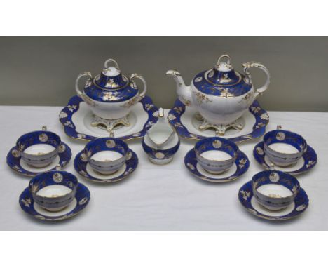 A late 19th-century Staffordshire tea set, having blue band over gilt decoration, comprising teapot, cream and sugar six cups