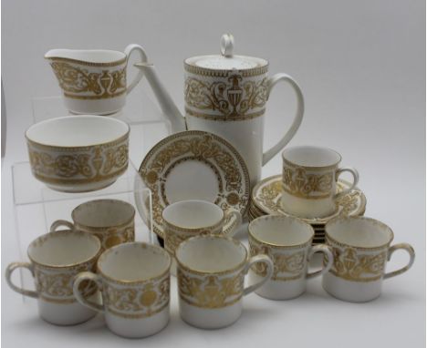 A Royal Worcester bone china coffee service for eight, Hyde Park pattern, comprising; cylindrical coffee pot with cover, milk