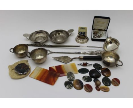 A Georgian silver ladle, the bowl with pouring spout, having gadrooned rim and twisted whale bone handle, two taste vins, a b