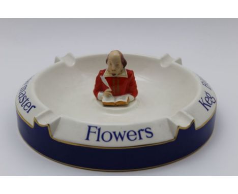 A Carltonware pottery bar top ashtray, advertising 'Flowers Brewmaster Keg bitter', with bust of Shakespeare to the centre, 2