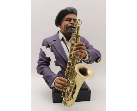 An 'All that Jazz' figure 'Sax Appeal', an Art Impressions edition, 2004, Willitts designs, and Sheng Lung, moulded and paint