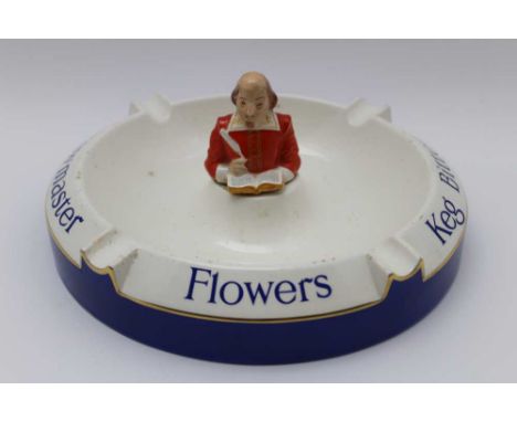 A Carltonware Flowers Brewers branded pottery ashtray, the centre, holding a bust of William Shakespeare, approx 23cm in diam