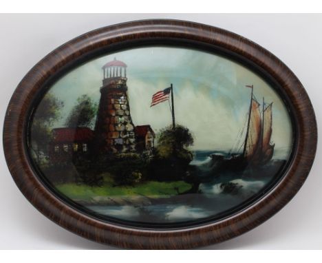 A reverse painted convex glass panel, decorated with North American lighthouse with sailboat c.1900, oval panel, 35cm x 50cm,