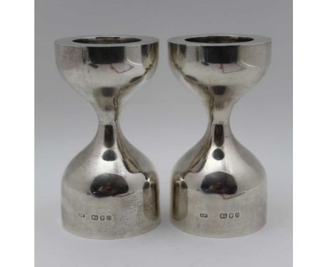 Robert Welch (Chipping Campden), A pair of late 20th century silver Limbrey candle holders, hourglass shape, London 1978, 14c