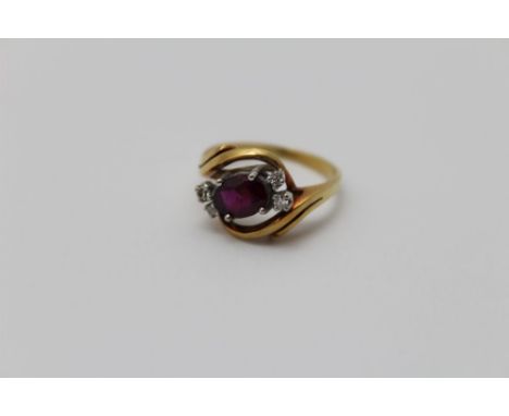 A Ruby &amp; Diamond ring, set in an 18ct gold band, gross weight; 4.8g, ring size; N 