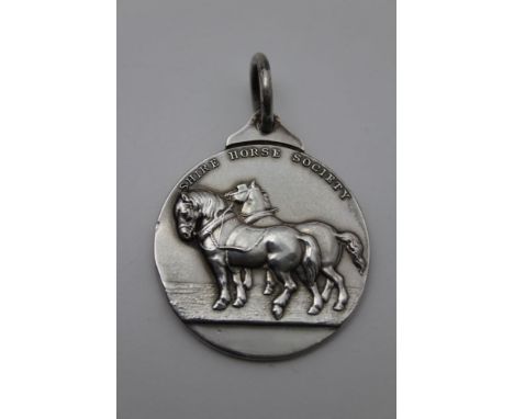 Mappin &amp; Webb, a silver 'Shire Horse Society' medal, cast one side with a pair of Shires in harness, to the reverse Queen