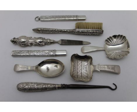 John Bettridge, a George III silver caddy spoon, bright cut decoration, Birmingham 1818, together with two other silver caddy