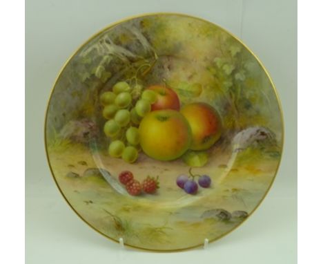 A ROYAL WORCESTER PORCELAIN PLATE hand-painted with fruit, signed A. Shuck, factory back stamp, 26.75cm diameter 