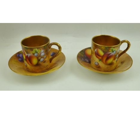 TWO ROYAL WORCESTER PORCELAIN COFFEE CANS WITH SAUCERS, hand-painted fruit decoration, signed Roberts, with factory back stam